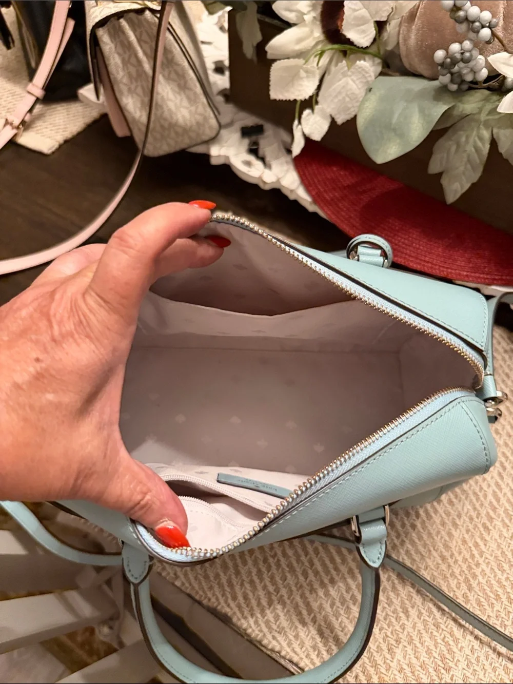 Kate Spade Devyn Medium Duffel Bag in the color Frosted Spearmint, featuring